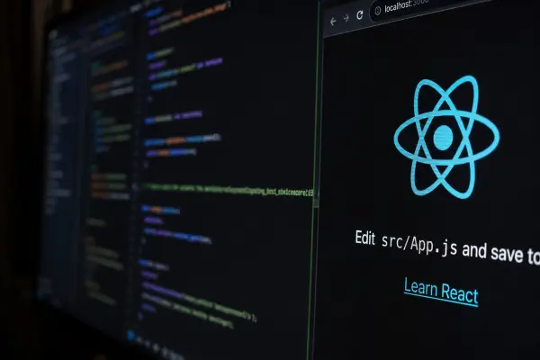 Code editor and browser showing the React starter page