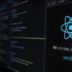 Code editor and browser showing the React starter page